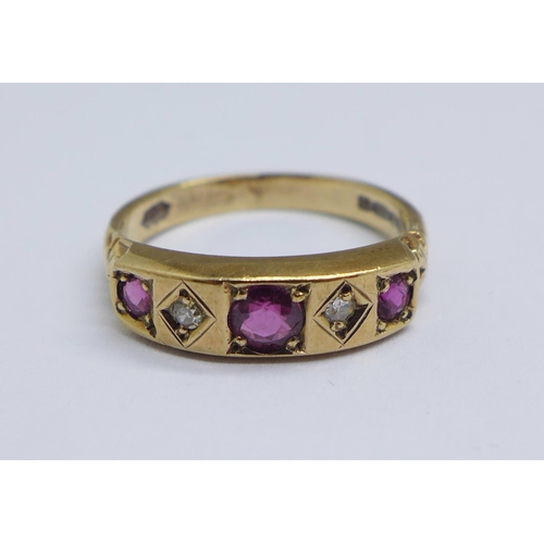 1114 - A 9ct gold, ruby and diamond ring, 3.0g, M