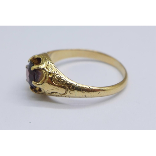 1116 - A 19th Century yellow metal and garnet ring, 3.8g, P (a/f, signs of old repair on shank)