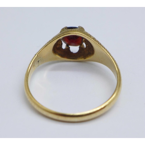 1116 - A 19th Century yellow metal and garnet ring, 3.8g, P (a/f, signs of old repair on shank)