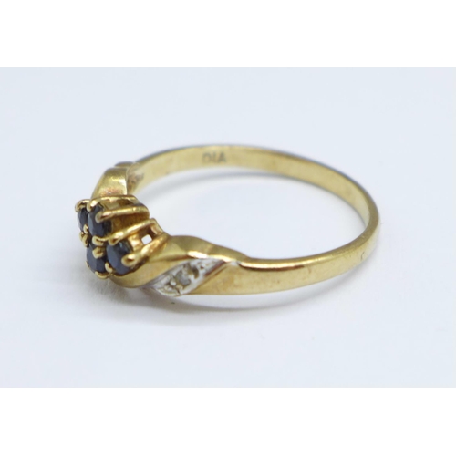 1117 - A 9ct gold, sapphire and diamond ring, 1.6g, N