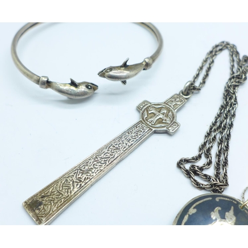 1123 - Two silver pendants and chains and a bangle