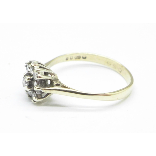 1125 - A 9ct gold nine stone diamond ring, 1.6g, M