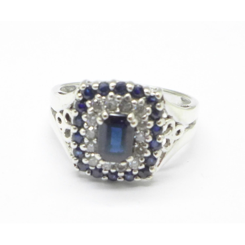 1126 - A 9ct white gold, sapphire and diamond ring, 4.1g, O/P