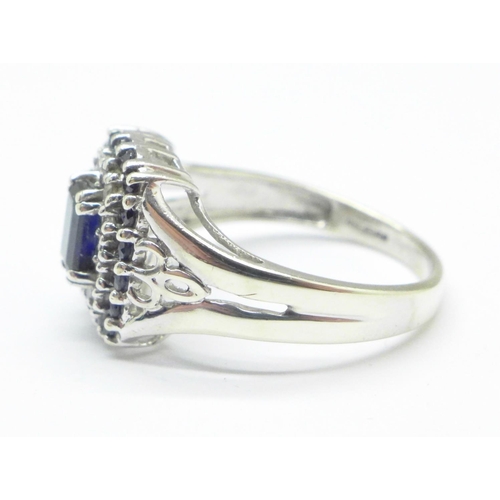 1126 - A 9ct white gold, sapphire and diamond ring, 4.1g, O/P