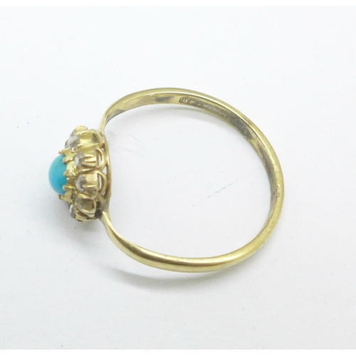 1131 - A turquoise and diamond ring, the shank marked Bravingtons, L