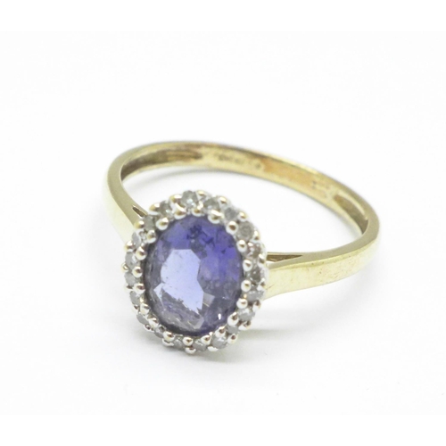 1136 - A 9ct gold, tanzanite and diamond cluster ring, 2.0g, O/P