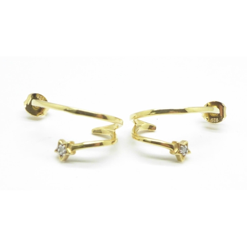 1139 - A pair of silver gilt and diamond set hoop earrings