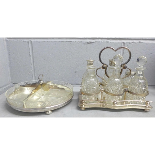 1159 - A silver plated cruet set and sandwich holder **PLEASE NOTE THIS LOT IS NOT ELIGIBLE FOR POSTING AND... 