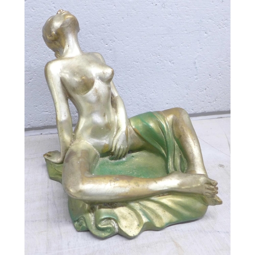 1185 - An erotic bronzed figure of a lady