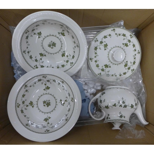 1202 - A Royal Doulton Greenwich TC1076 green part dinner service; six cups, six saucers, a teapot and two ... 