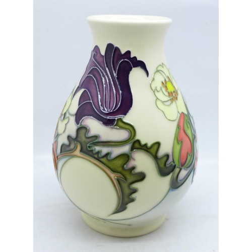 601 - A Moorcroft Sandringham Bouquet baluster vase, designed by Emma Bossons, 14cm