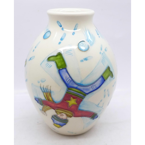 603 - A Moorcroft Snow Angel vase, designed by Helen Dale, 13.5cm