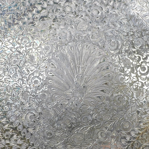 613 - A silver plate on copper tray, 39cm