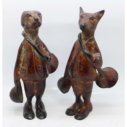 617 - Two novelty cast metal fox hunting themed figures, fox and hound, 17.5cm