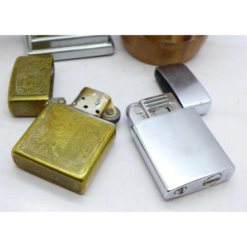 636 - Two table lighters and Zippo and Colibri lighters