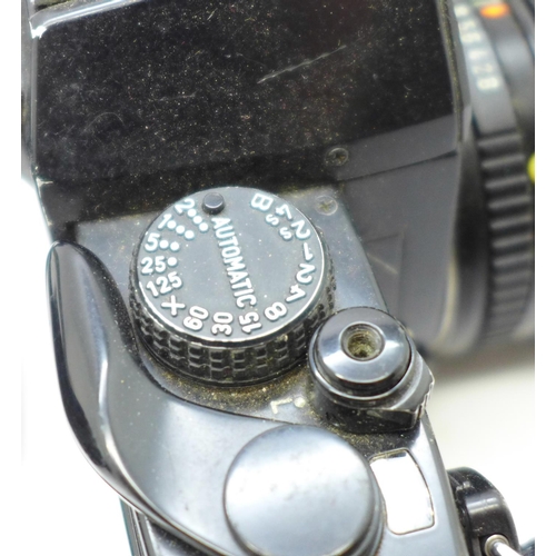 638 - A Pentax ILX 35mm film camera with Pentax zoom lens and a Hawk-eye No 2 Folding Film Pack, 40-80mm