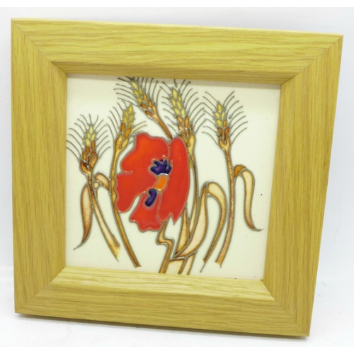 647 - A Moorcroft framed tile, 'Harvest Poppy' design, by Emma Bossons