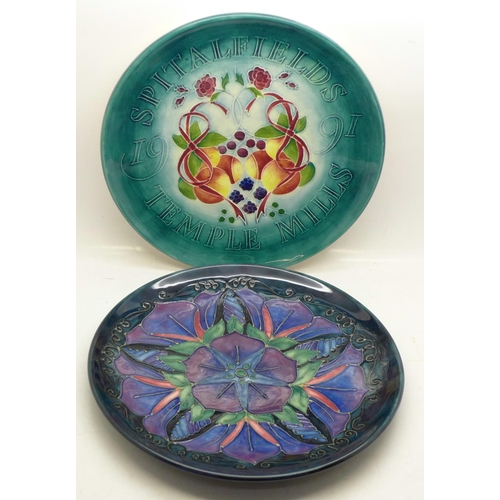 672 - Two Moorcroft pottery wall plates, the first for Spitalfields Temple Mills 1991, impressed mark with... 