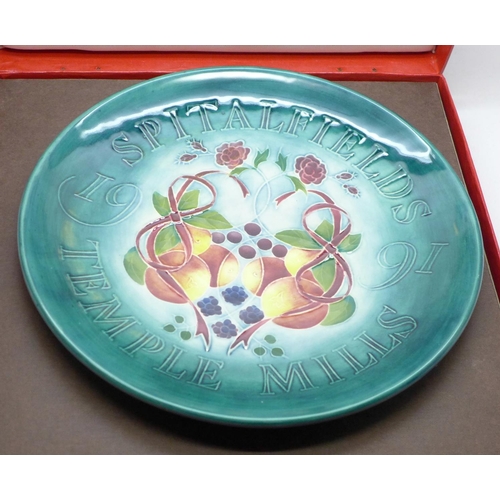 672 - Two Moorcroft pottery wall plates, the first for Spitalfields Temple Mills 1991, impressed mark with... 