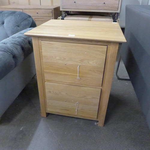 1313 - An oak two drawer filing chest  *This lot is subject to VAT