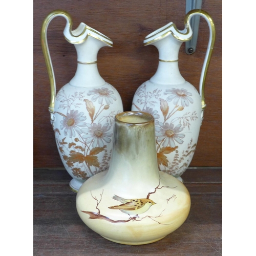 676 - A pair of blush ivory vases, EFB & Son, Dorio pattern and a vase decorated with a bird on a branch, ... 