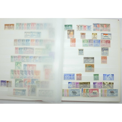 678 - Stamps:- KGVI Commonwealth mint stamps in stock book with sets and part sets, noted GB £1 silver wed... 