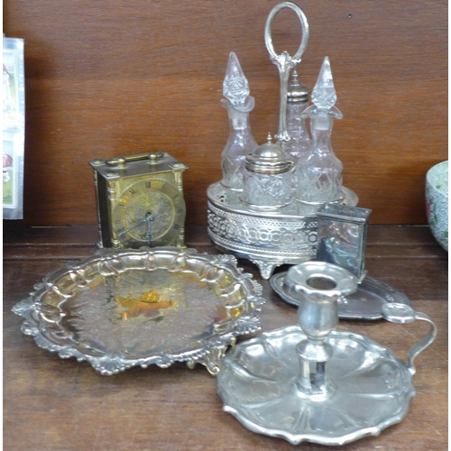 684 - A silver plate on copper tray, a chamber stick, a/f, an Elkington plate matchbox holder, a four bott... 