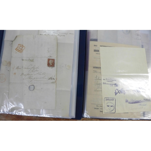 691 - Stamps:- postal social history in two files with forty items of postally used printed forms, etc., c... 