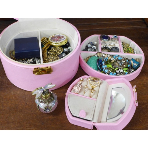 697 - A jewellery box with a dragon scent bottle and costume jewellery