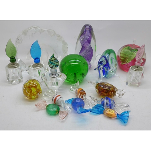 701 - A collection of paperweights, perfume bottles and glass sweets