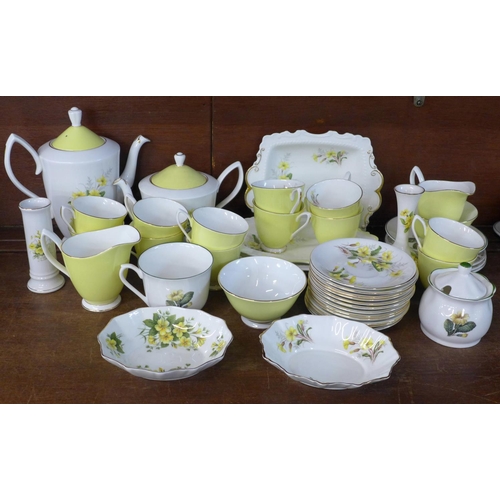 704 - A Royal Albert Primrose coffee set and vases, bowls, etc.