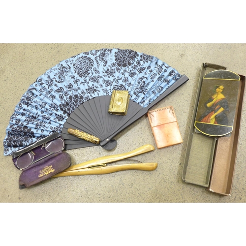 717 - A pair of glove stretchers, a brass vesta case, an early plastic cigarette case, pair of glasses and... 