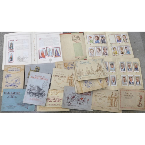 720 - Twenty cigarette card albums including Wills, Park Drive and Players