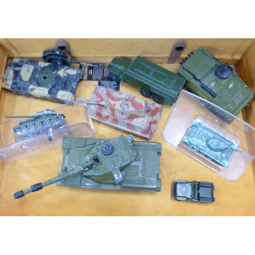 755 - A collection of Dinky and Corgi die-cast tanks and vehicles, etc.