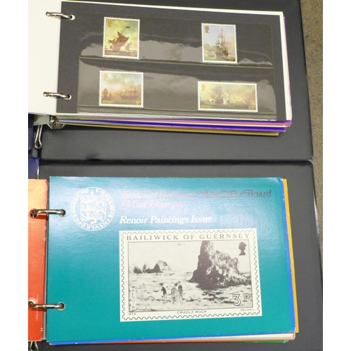 764 - Stamps:- Channel Islands presentation packs and First Day Covers in four albums