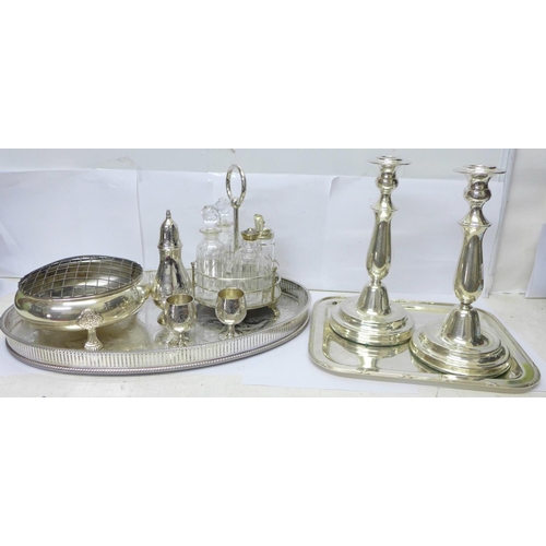 791 - Assorted plated ware; pair of candlesticks, two trays, sugar shaker, four bottle condiment set, etc.