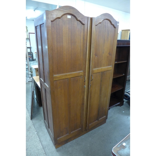 280 - A beech fitted wardrobe