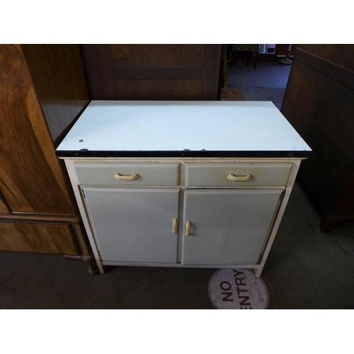 291 - A 1960's painted metamorphic kitchen cabinet