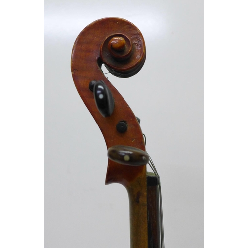 803 - A ¾ violin and bow, cased, length of back without button, 33.5cm