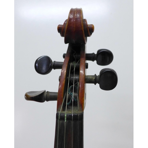 803 - A ¾ violin and bow, cased, length of back without button, 33.5cm