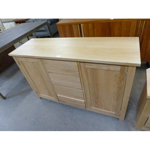 1352 - An oak two door four drawer sideboard  *This lot is subject to VAT MISSING HANDLE.