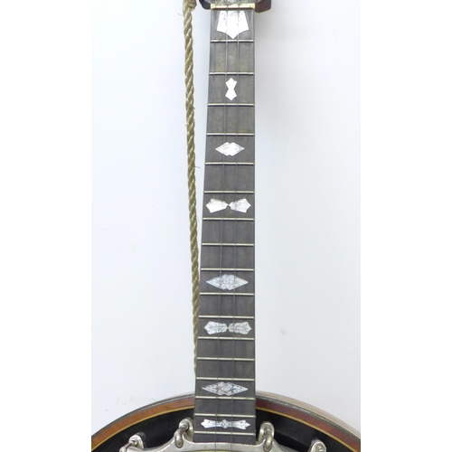 807 - A ukulele banjo, once the property of Eric Delmar, a/f, with photograph of Eric Delmar with instrume... 