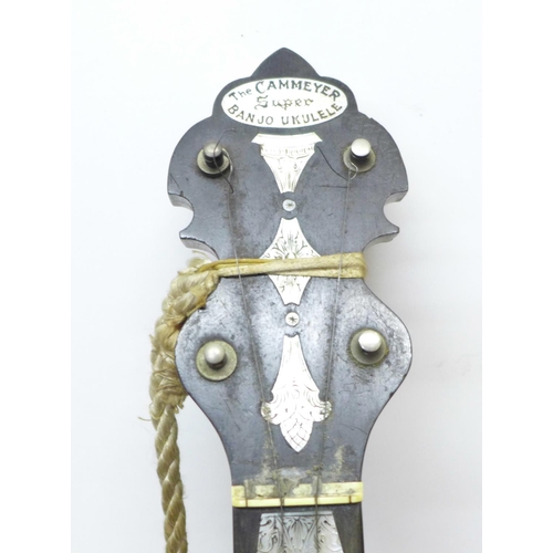 807 - A ukulele banjo, once the property of Eric Delmar, a/f, with photograph of Eric Delmar with instrume... 