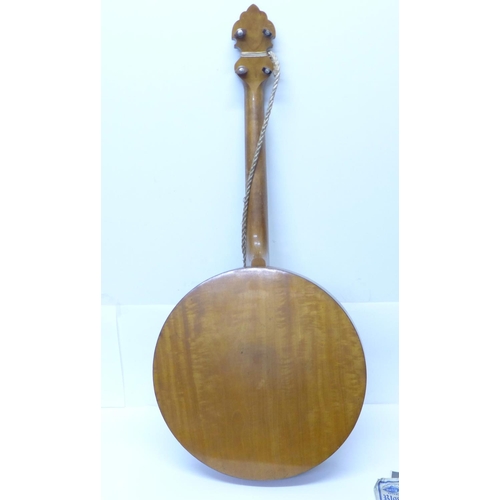 807 - A ukulele banjo, once the property of Eric Delmar, a/f, with photograph of Eric Delmar with instrume... 