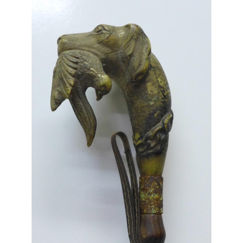 810 - A shoehorn with novelty carved dog's head handle