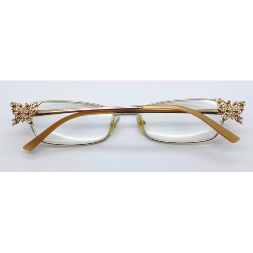 818 - A pair of Valentino reading glasse