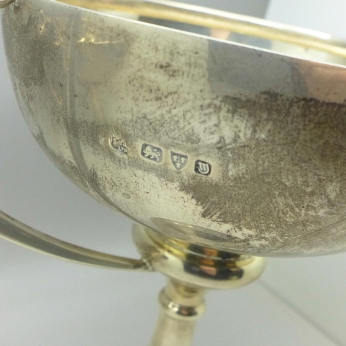 822 - Two silver trophies, with 1930's inscriptions, total weight 630g, (one trophy weighted)