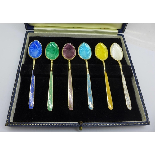 839 - A cased set of six silver and enamel coffee spoons, one a/f, 76g