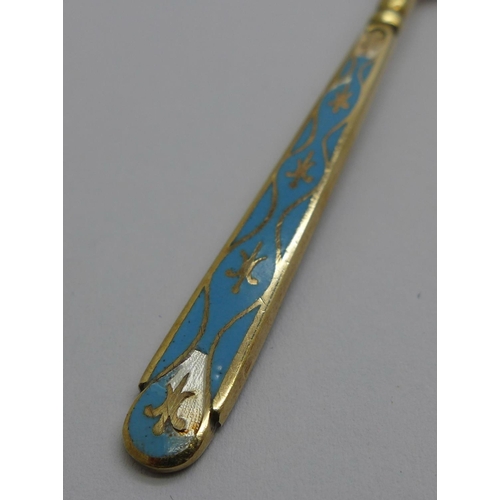 839 - A cased set of six silver and enamel coffee spoons, one a/f, 76g