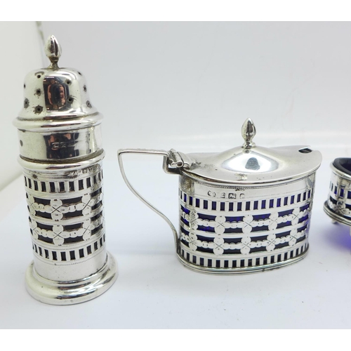 847 - A late Victorian period five piece sterling silver cruet set of open-worked design and form, all but... 